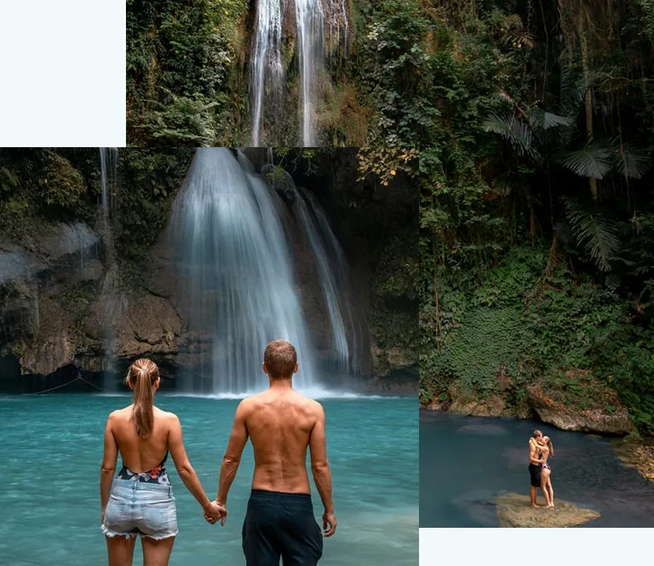 Daniel und Jessy von Life to go stehen Hand in Hand vor einem tropischen Wasserfall mit türkisblauem Wasser, umgeben von dichter grüner Vegetation